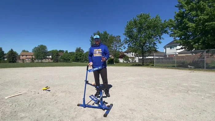 Place a ball into the holder.