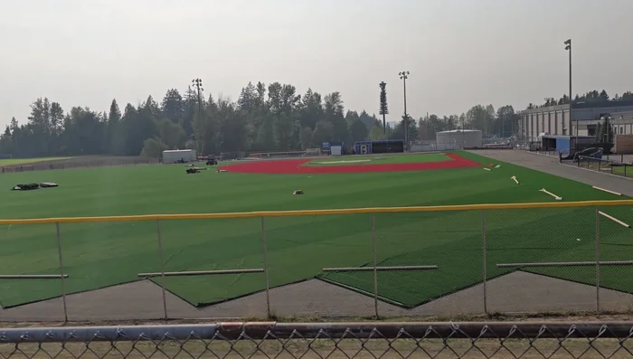 Add infield mix. The infield was cut and prepared using a specialized mix.