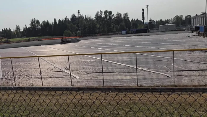 Add drainage rock. A layer of drainage rock was added for better drainage.