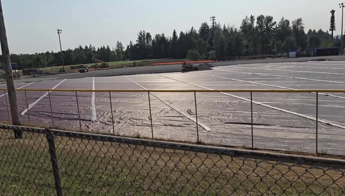 Add drainage rock. A layer of drainage rock was added for better drainage.