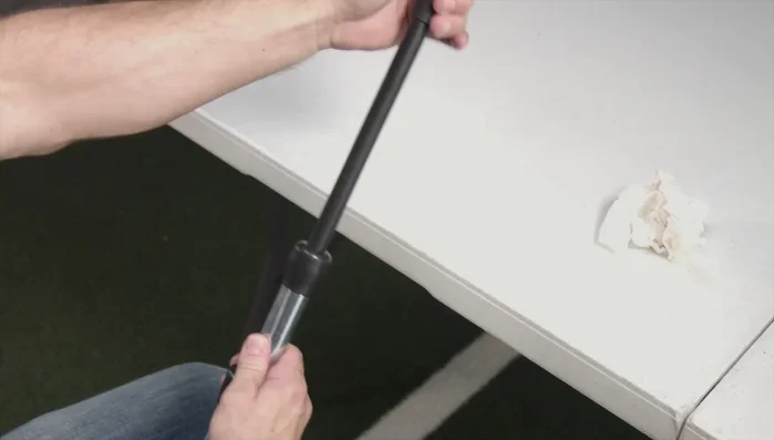 Tap the T against the table to assist in securing the flex top. Set the friction to your preferred tightness.