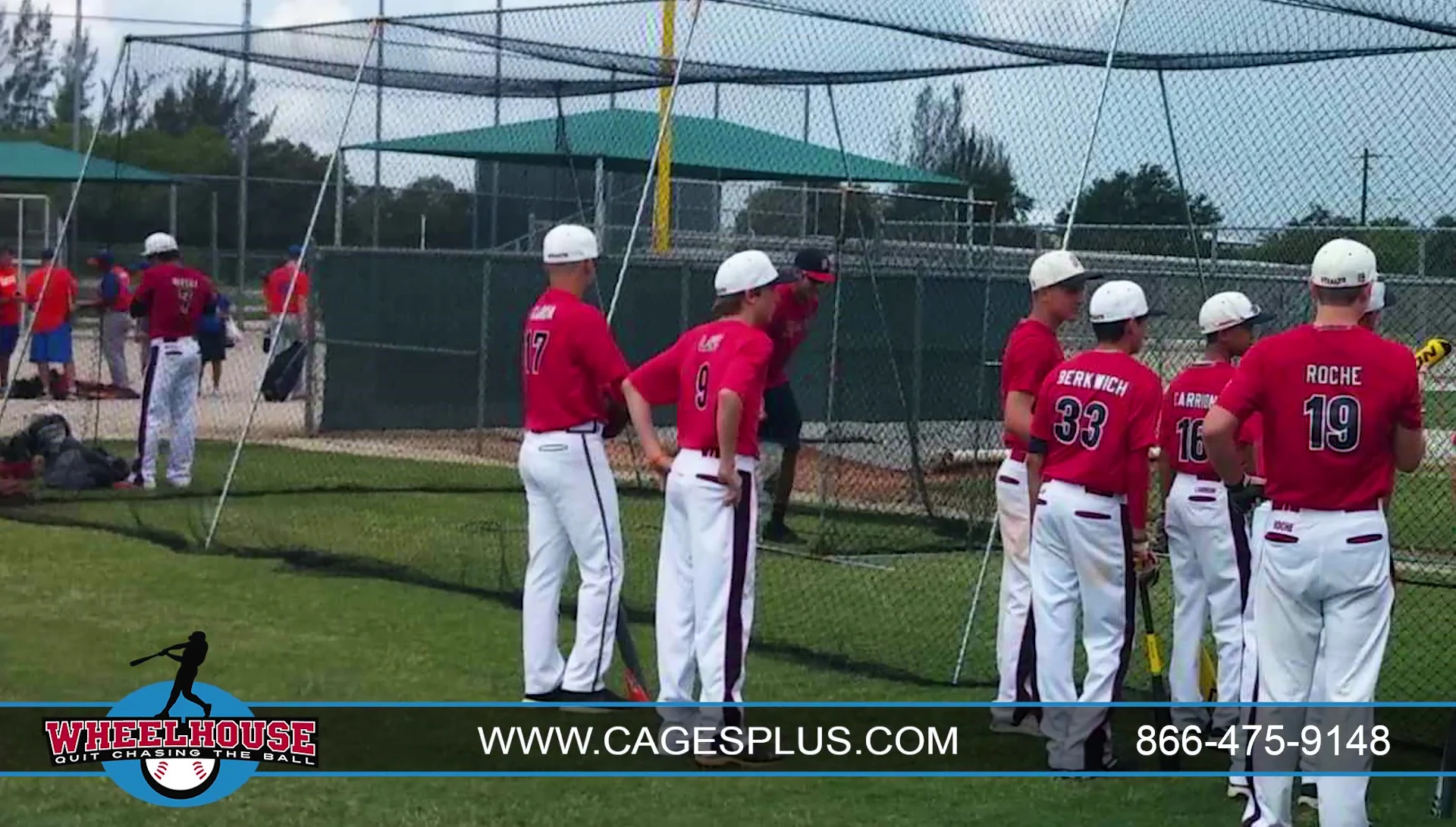 People easily transporting the batting cage, highlighting its portability