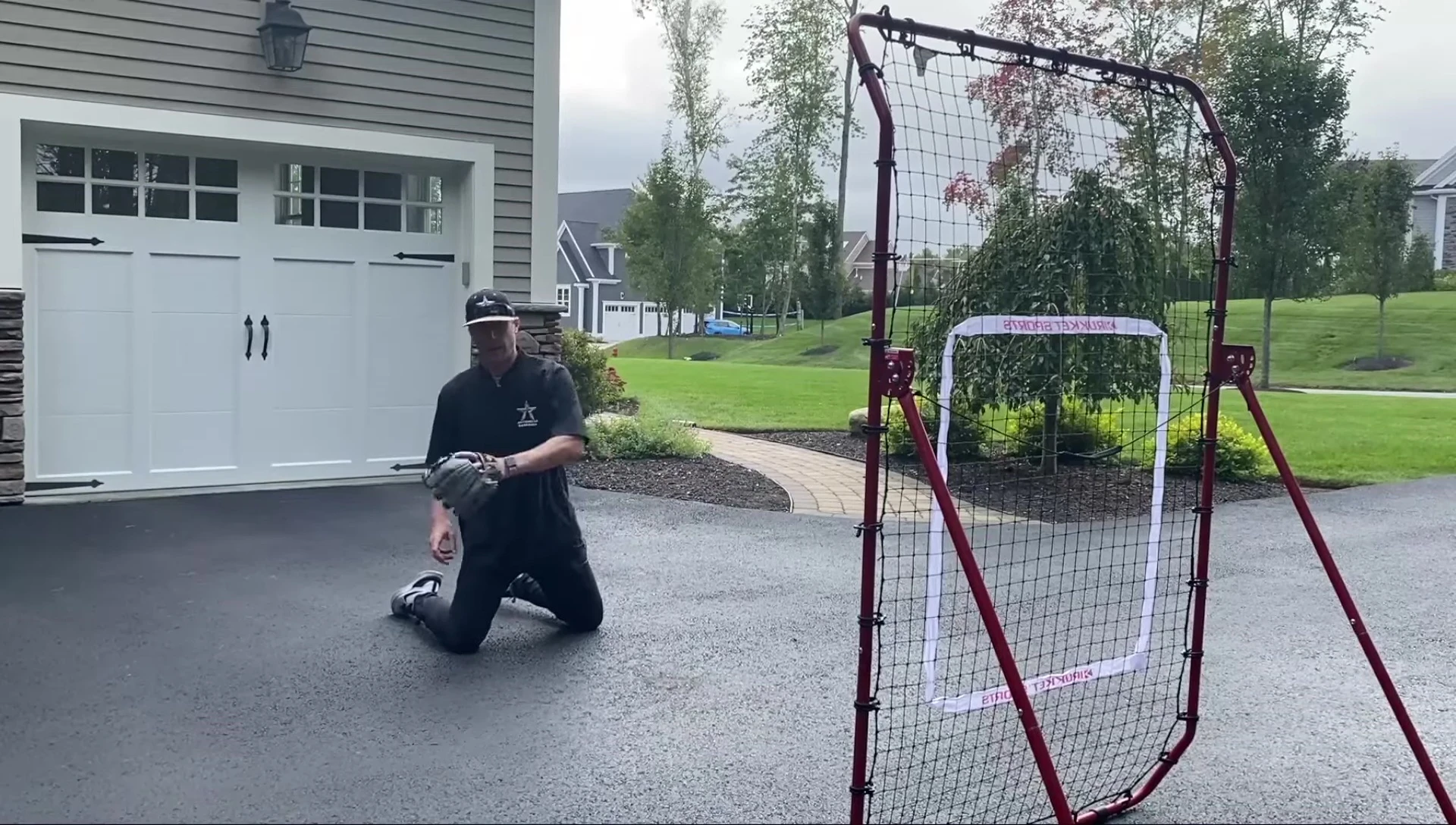 Player showing a one-handed backhand fielding technique