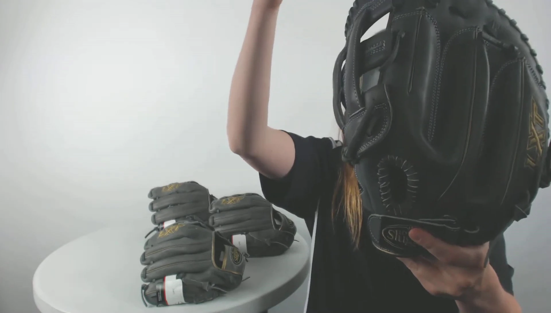 Close up highlighting the leather material of the glove.