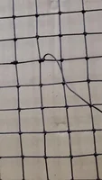 Repairing a Damaged Fishing Net: The Double Fisherman's Knot Method