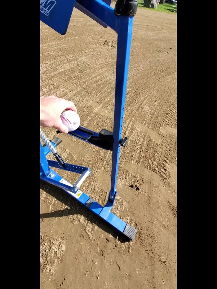 Engage the Foot Pedal: Put your foot on the lever to hold the machine in place.