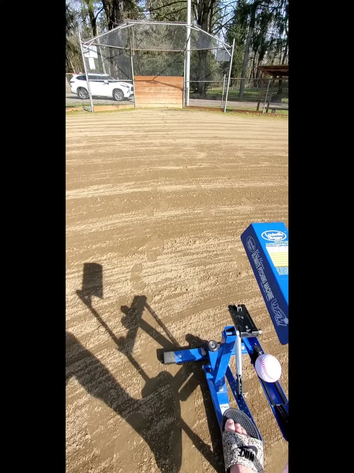 Engage the Foot Pedal: Put your foot on the lever to hold the machine in place.