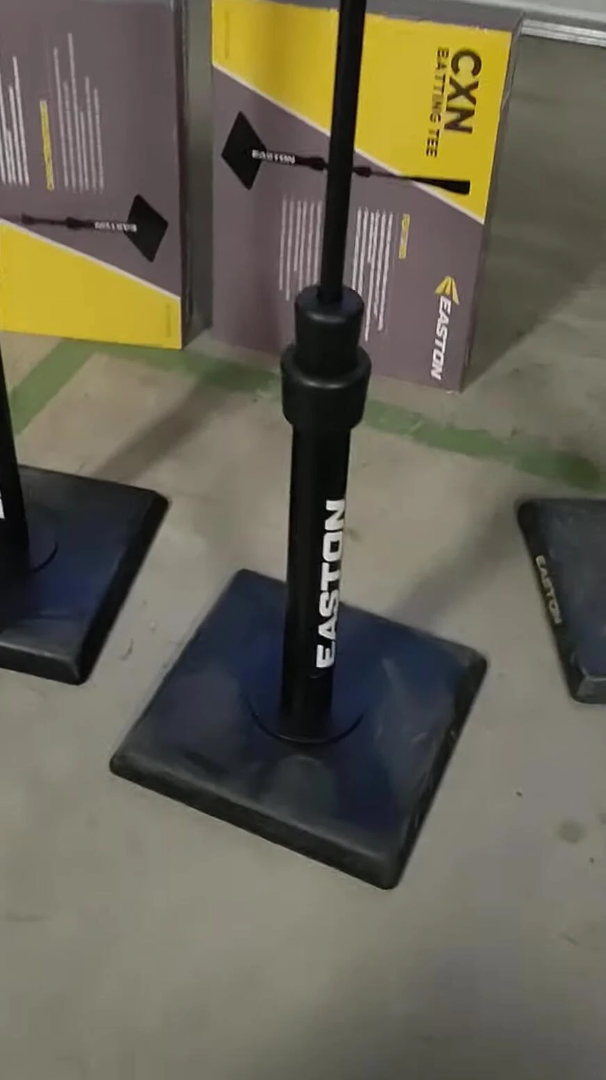 The presenter is holding the Easton CXN and the Tanner T.