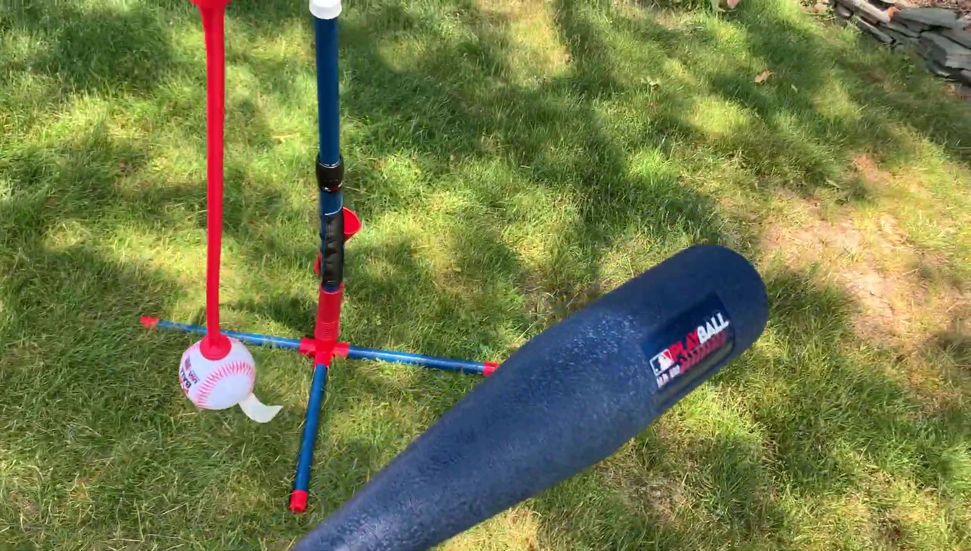 Children hitting the ball off the tee.