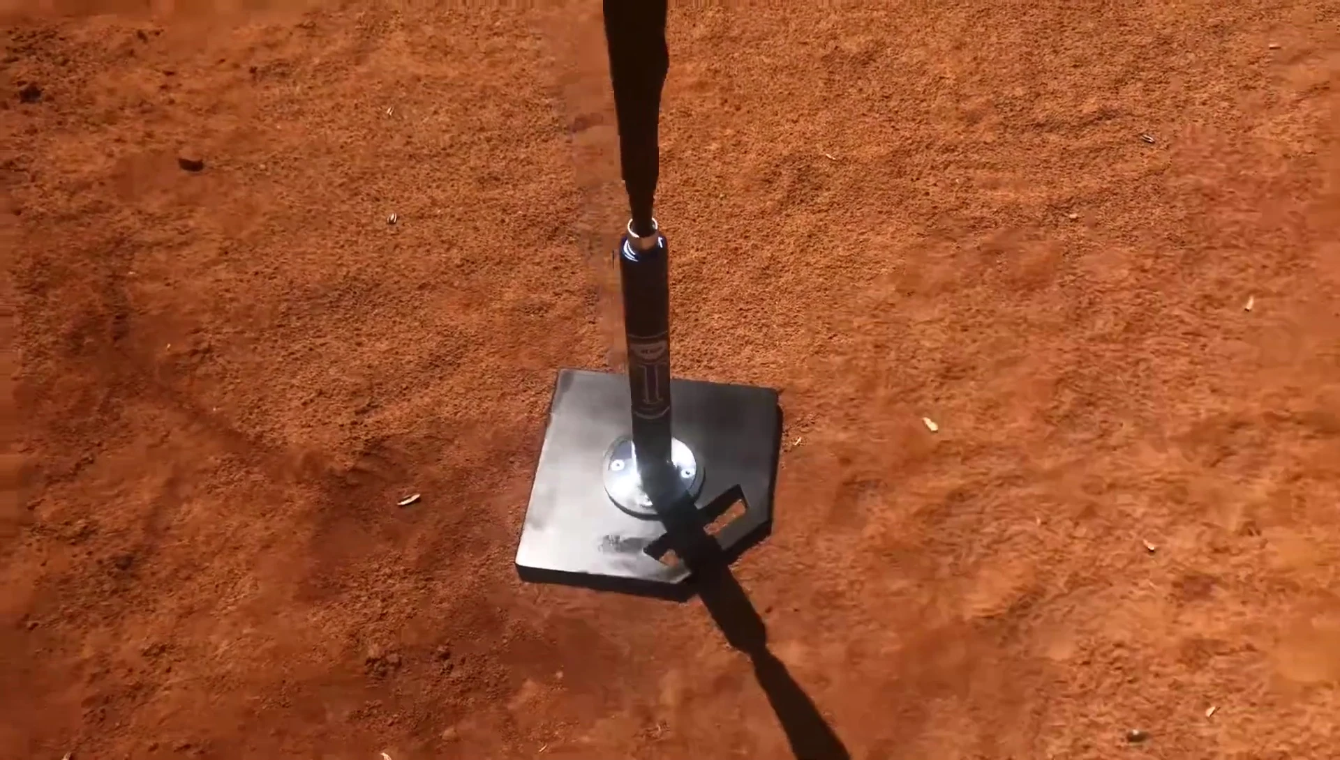 The built-in handle of the Jugs batting tee.