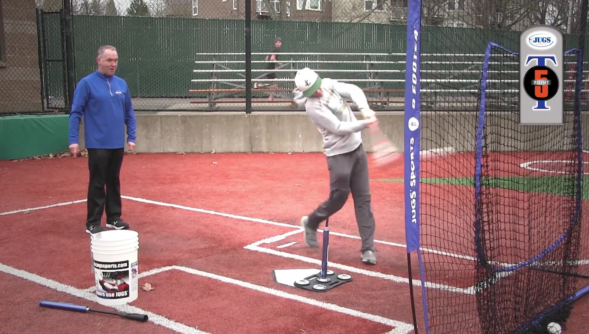 Batter demonstrating weight shift with both feet down.