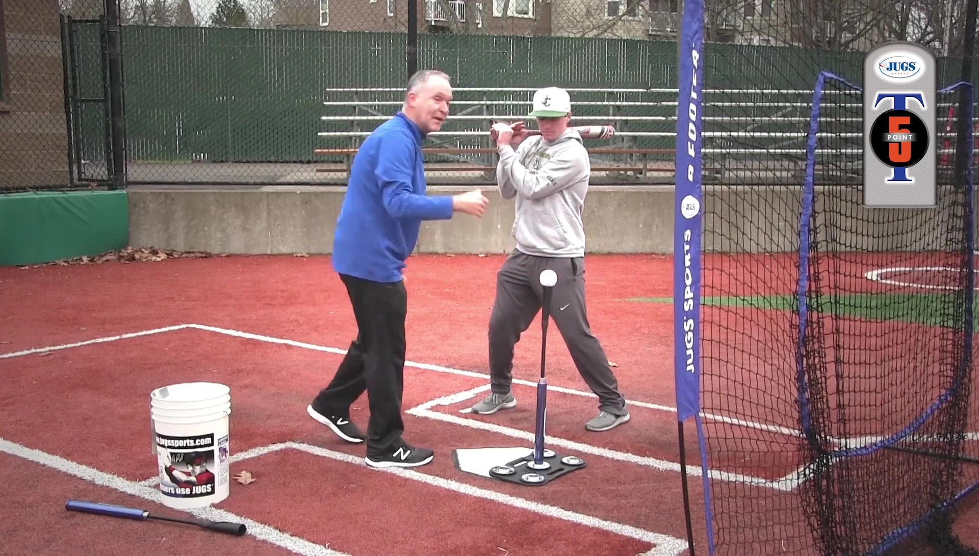 Batter maintaining balance during weight transfer.