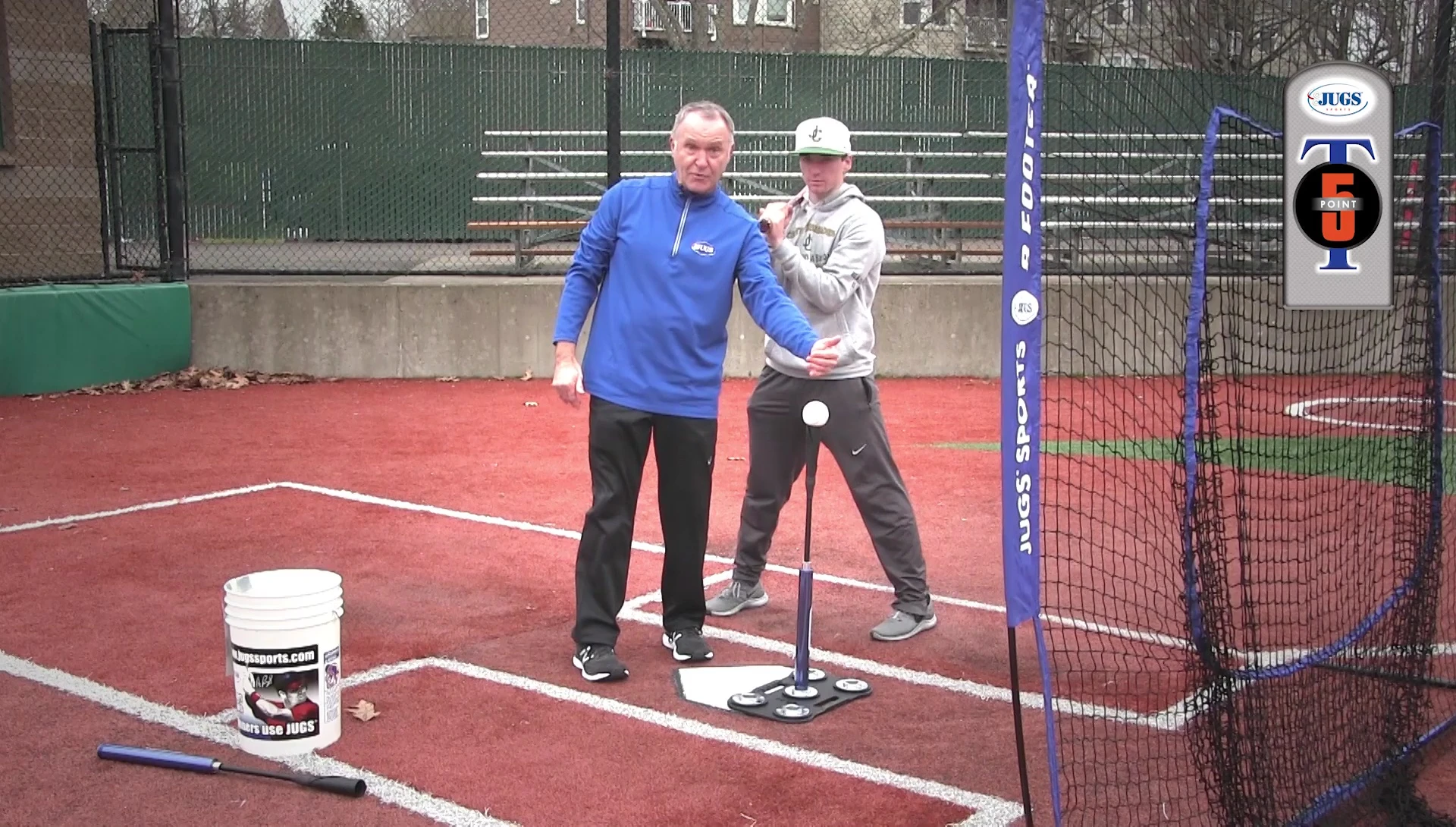 Batter showing the ball position in front of the plate.