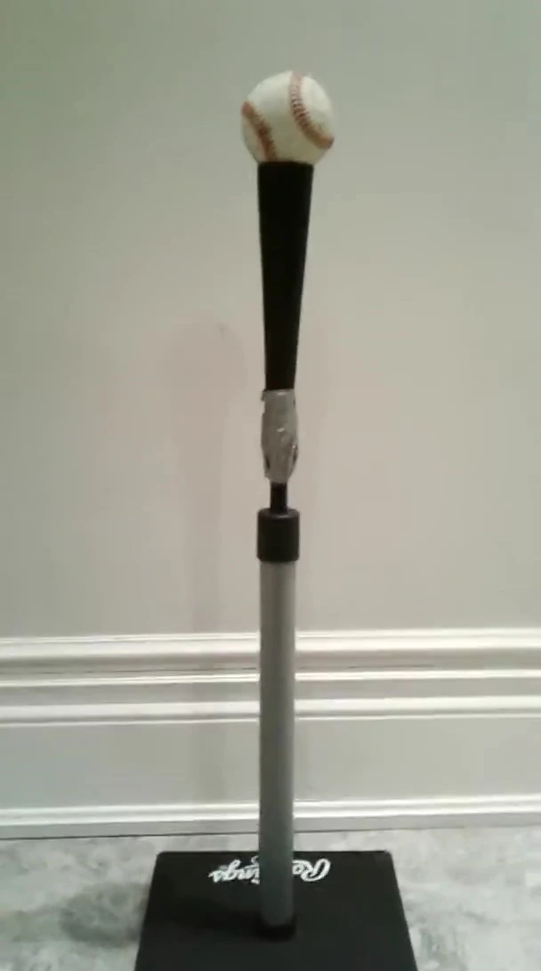 The reviewer shows how they fixed the loose top piece with duct tape.