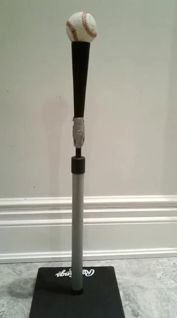 Showing the adjustability of the tee's height.