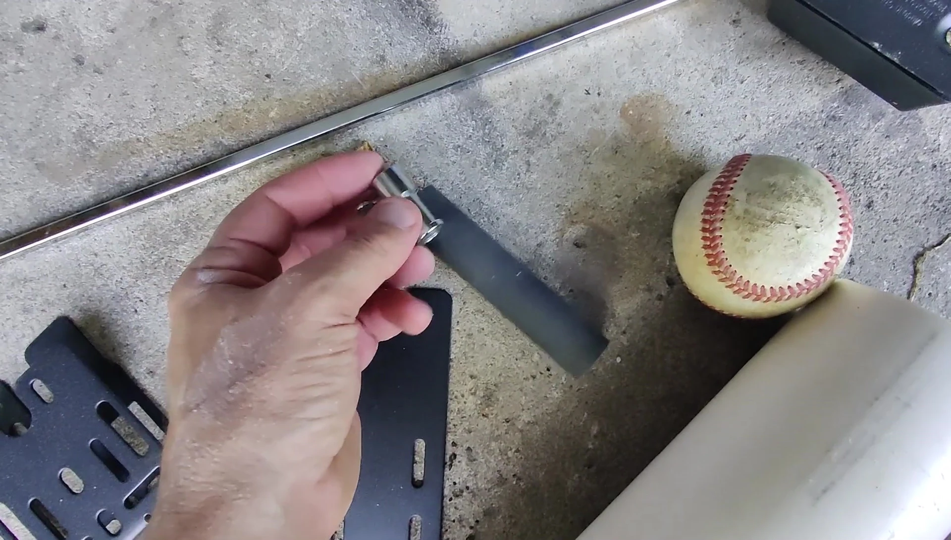 The collars being attached to the bar
