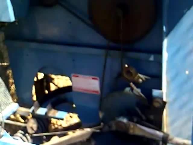 Close-up shot of the pitching hand mechanism in action.