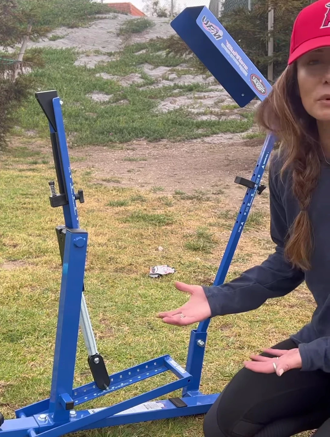 Close-up shot of the pitching machine being assembled, showcasing its ease of setup.