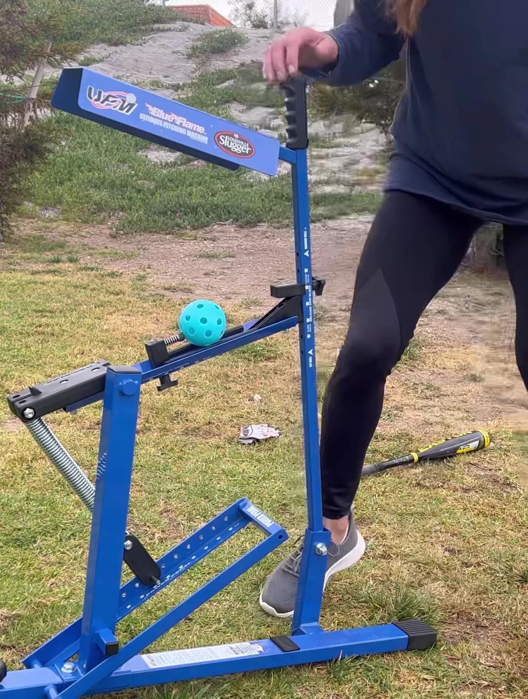 Close-up of the pedal being depressed, launching a ball.