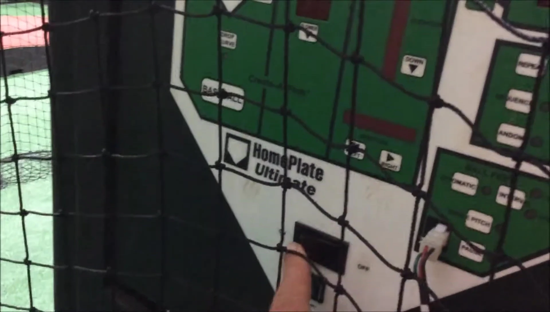 The Homeplate pitching machine powering up