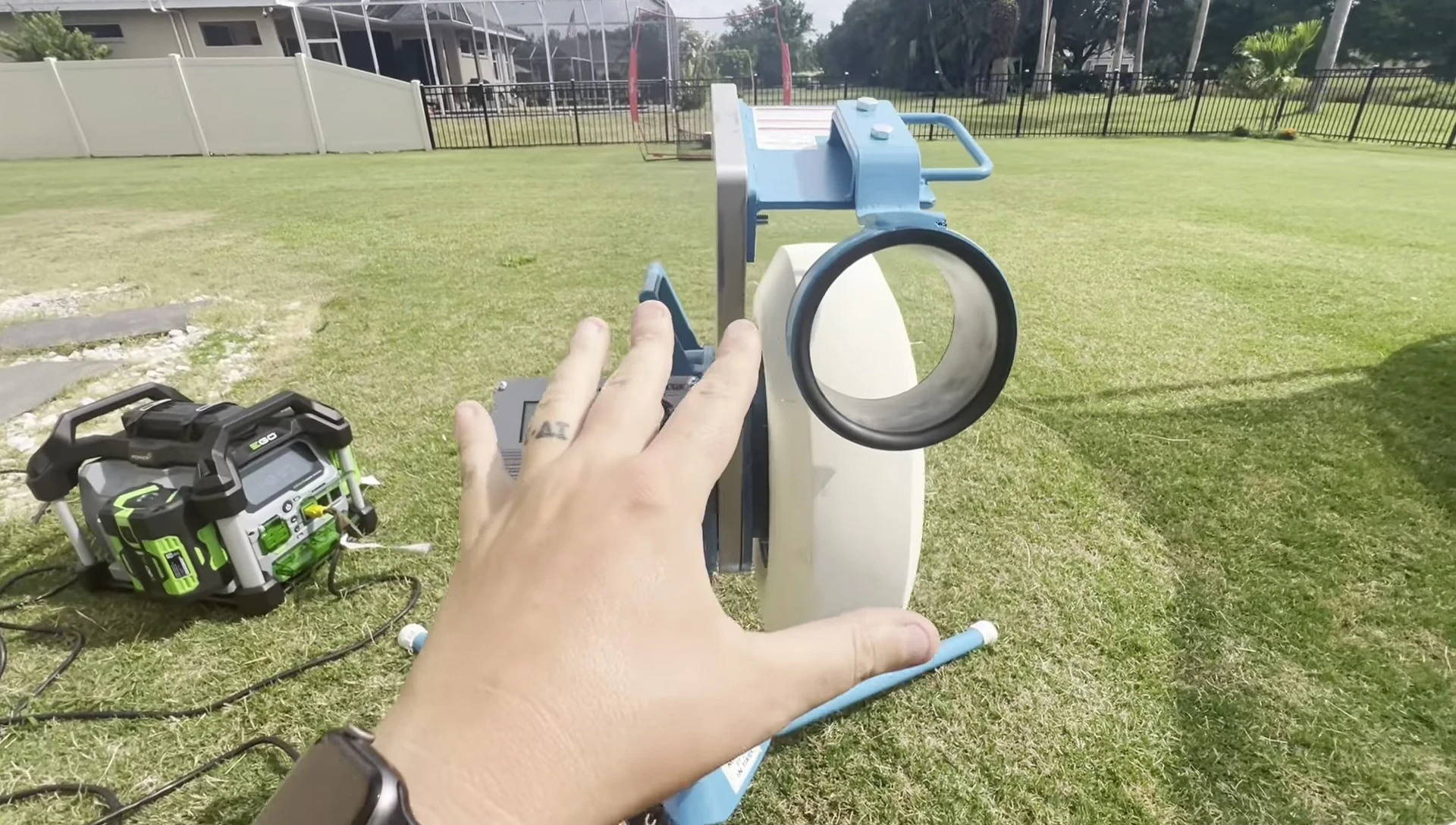 Person demonstrating the weight of the Jugs BP1
