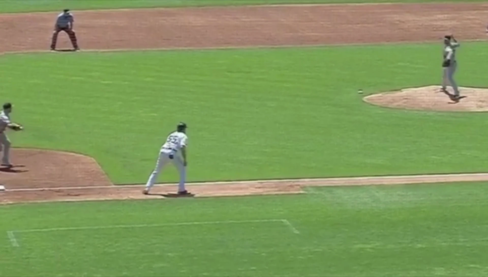 Emphasis on the pitcher's need for a quick and accurate throw.