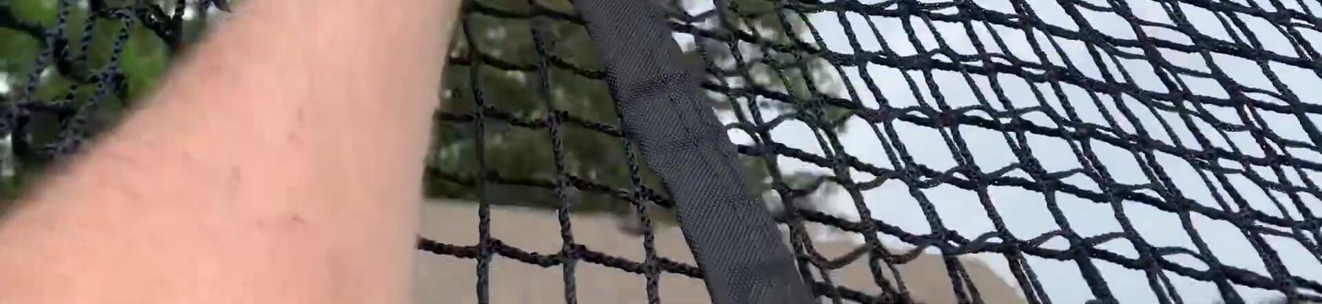 Demonstration of attaching the secondary net via Velcro.