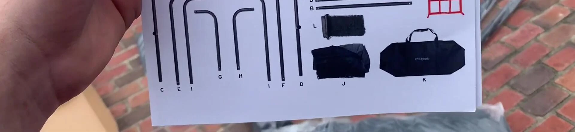 Unboxing the GoSports net, showing the various components and carry bag.