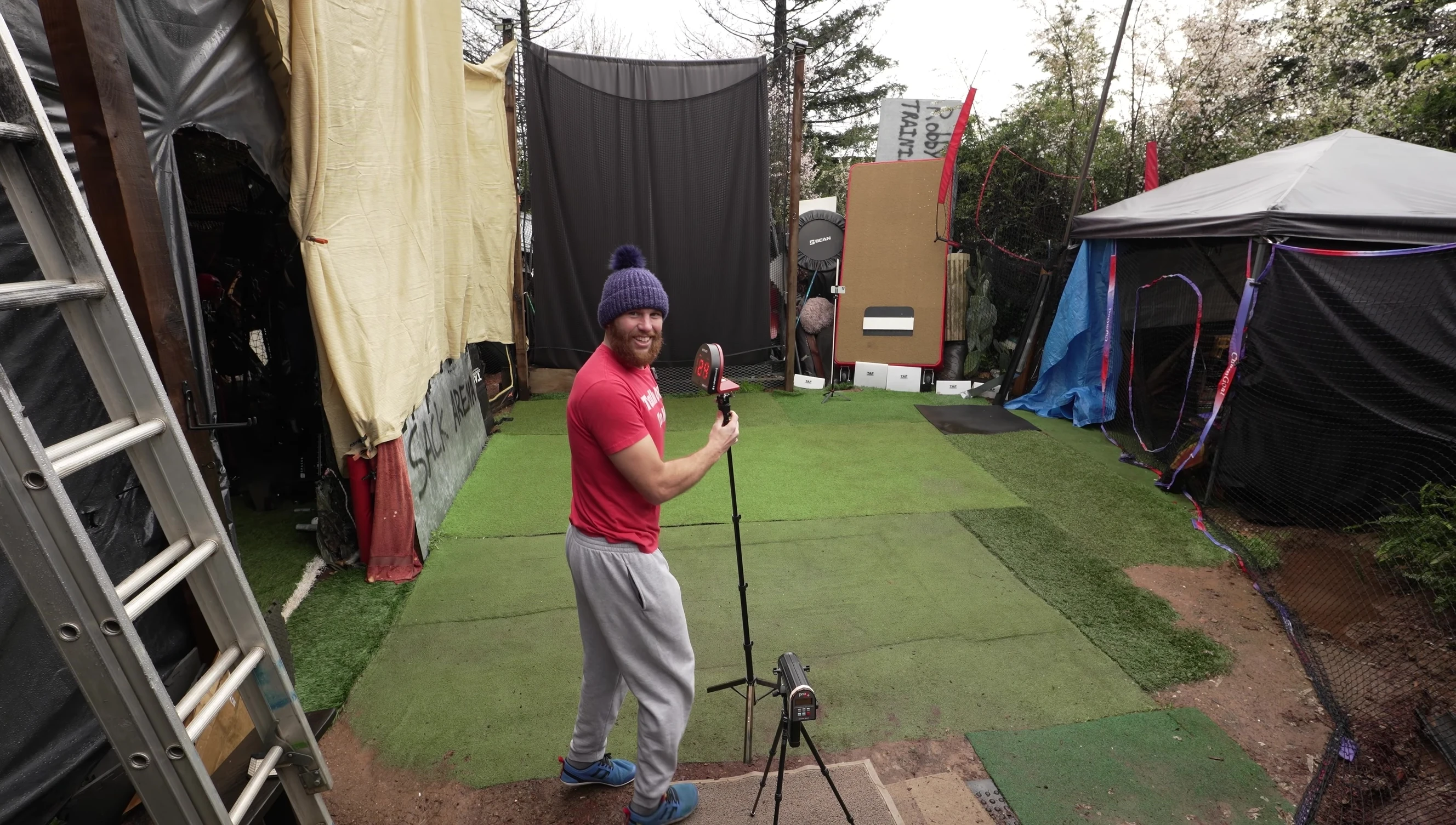 The reviewer starting to throw the baseball