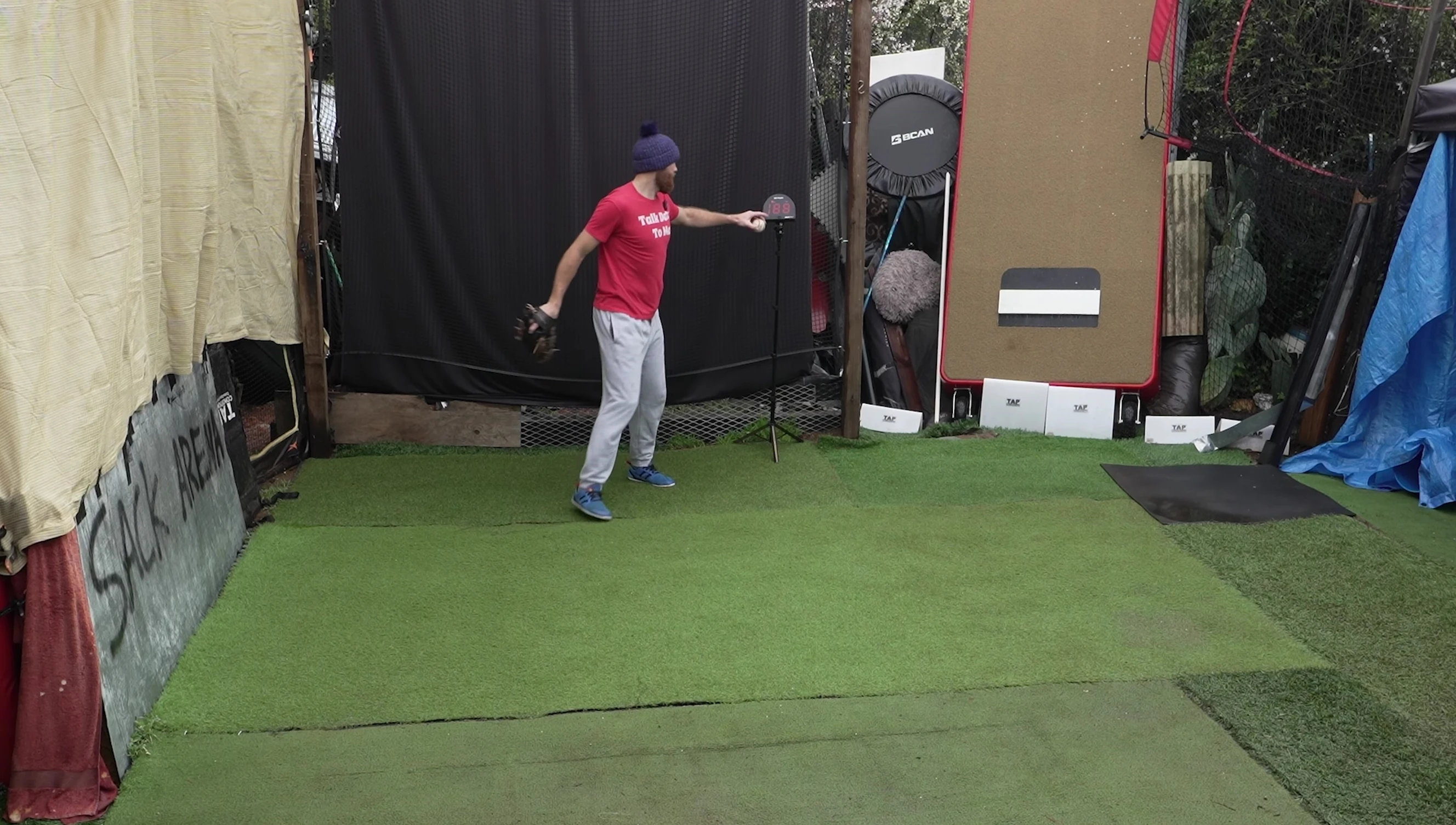 The reviewer explaining the optimal position to place the NetPlayz radar gun