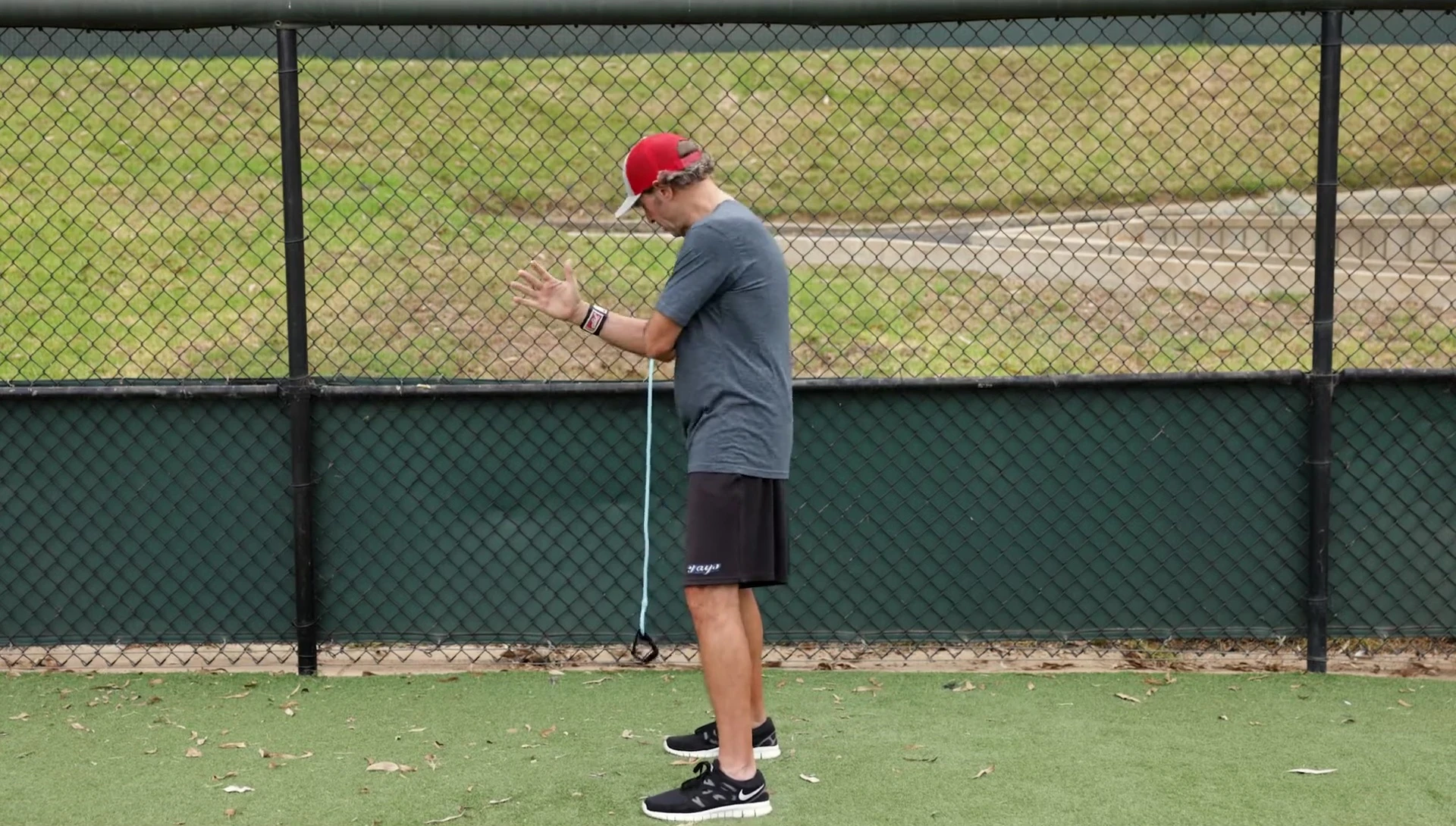 Instructor demonstrating the hand placement under the armpit
