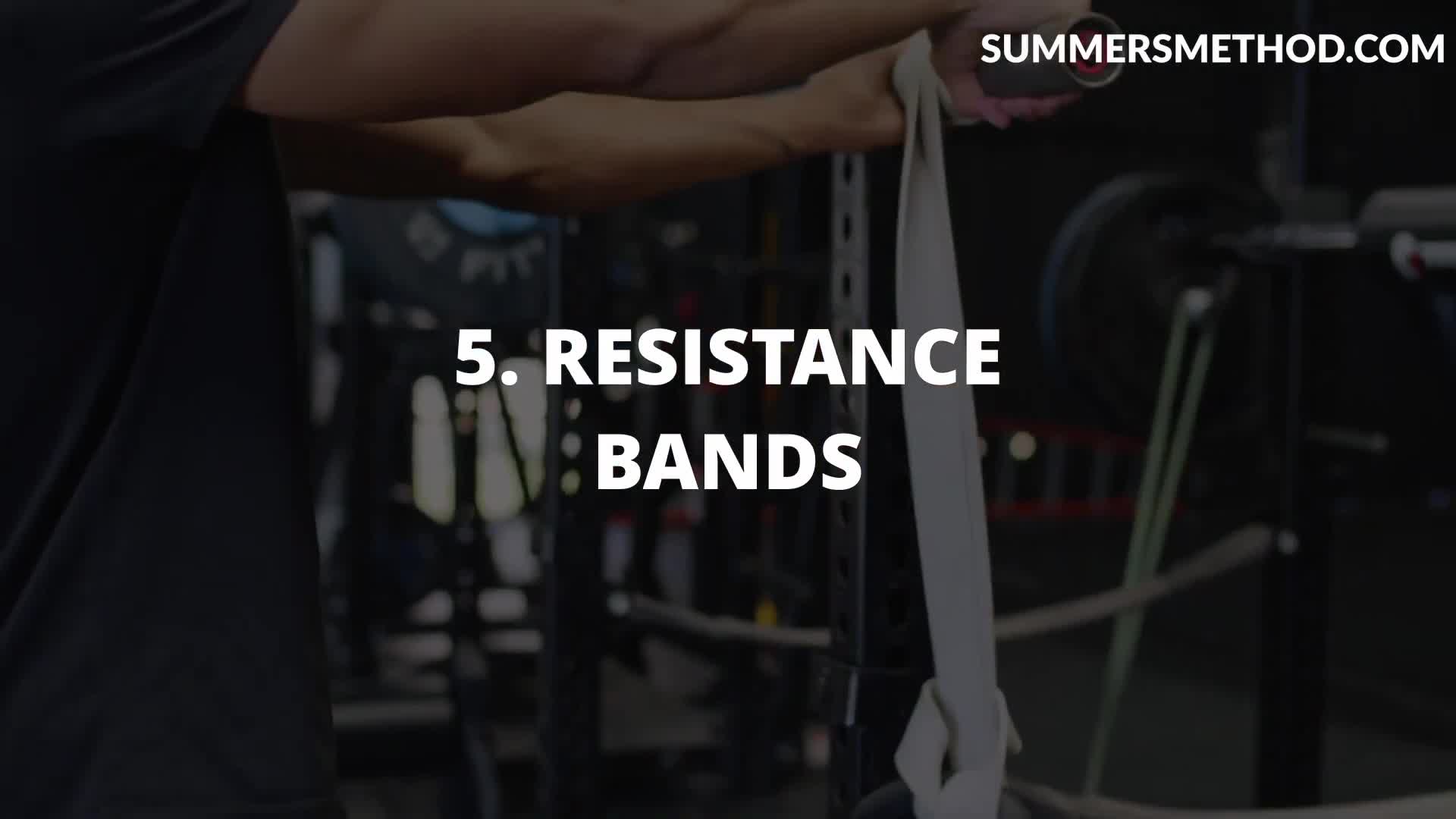 Close-up of resistance bands being used in a workout.