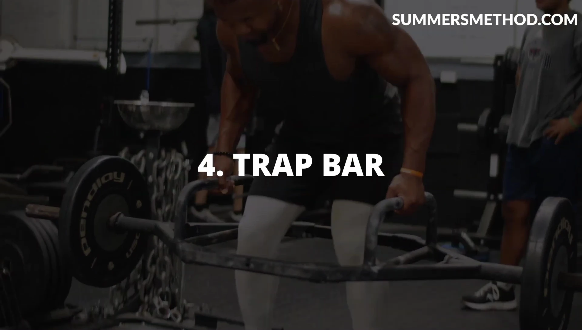 Athlete using a trap bar during a workout.