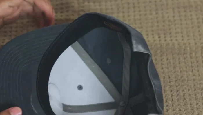 For stubborn stains, add a bit of Oxiclean to your cleaning solution (but don't apply directly to the hat).