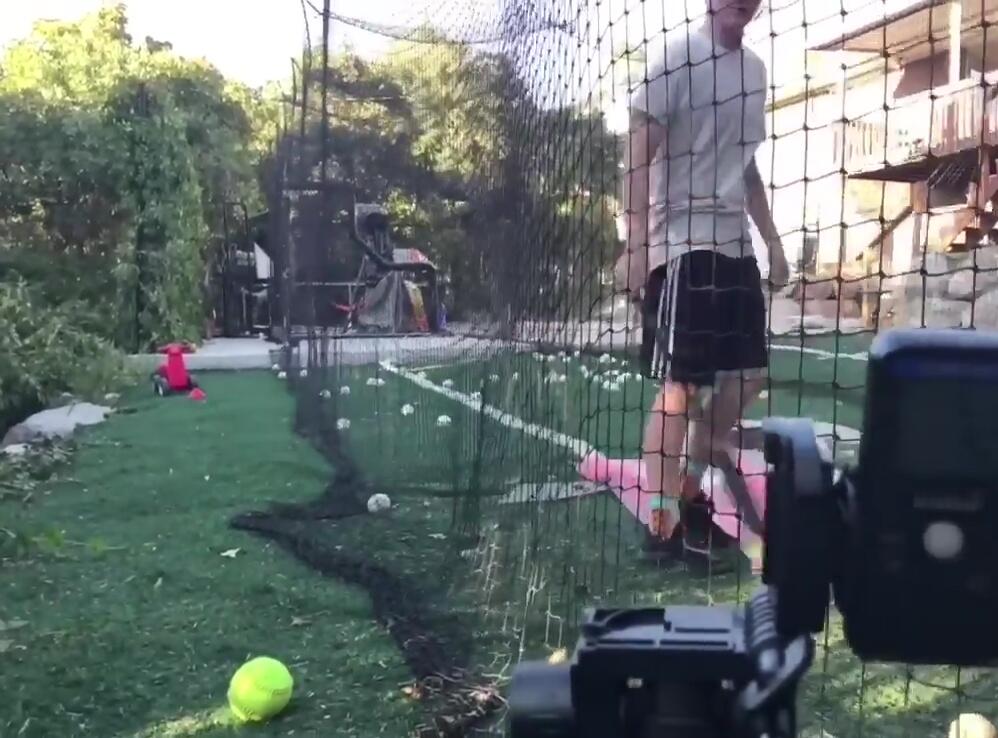 Demonstrating the correct angle for optimal Smart Coach accuracy.