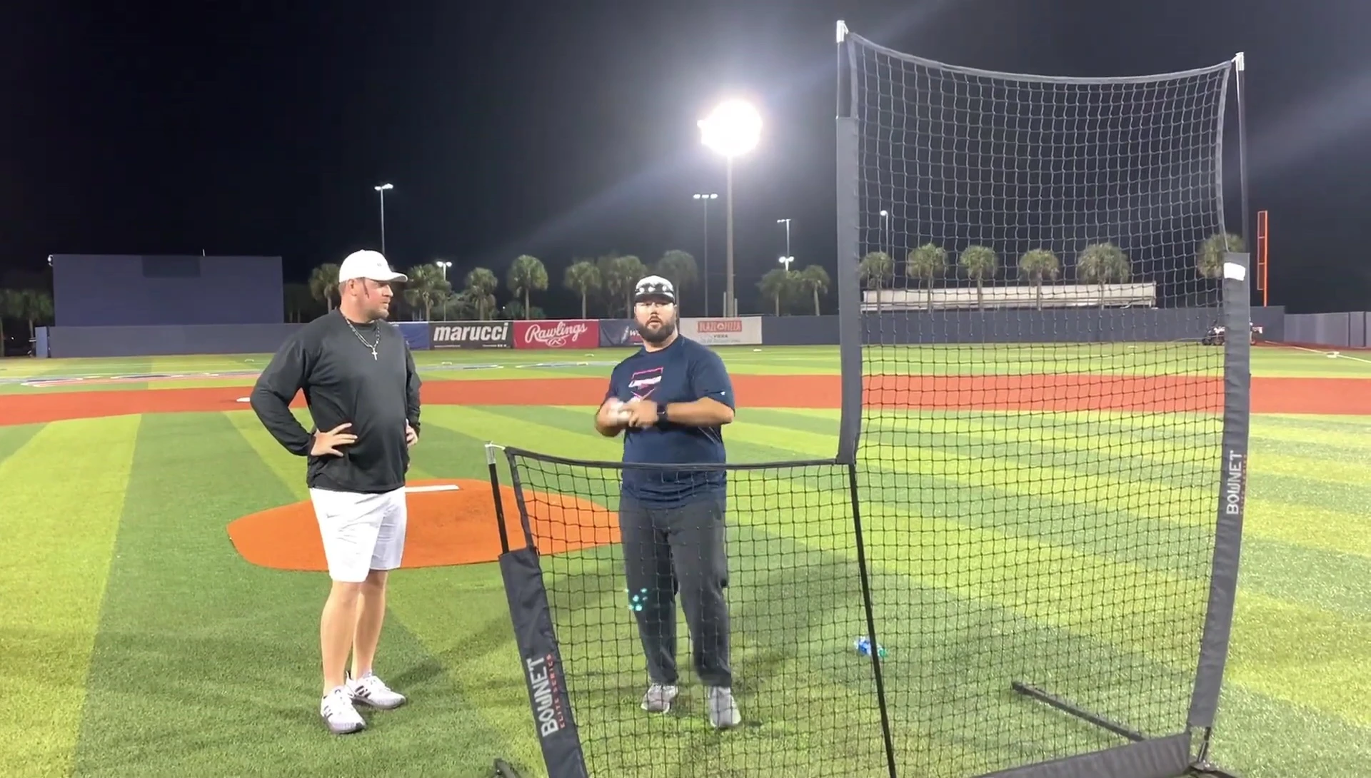 Coach describing the technique of lobbing softer pitches for younger players.