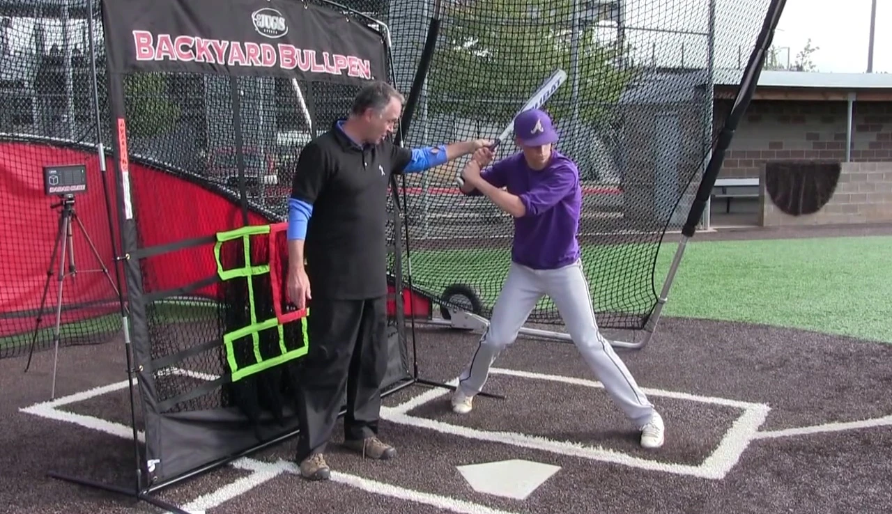 Back leg moving to power 'L' position, initiating the swing