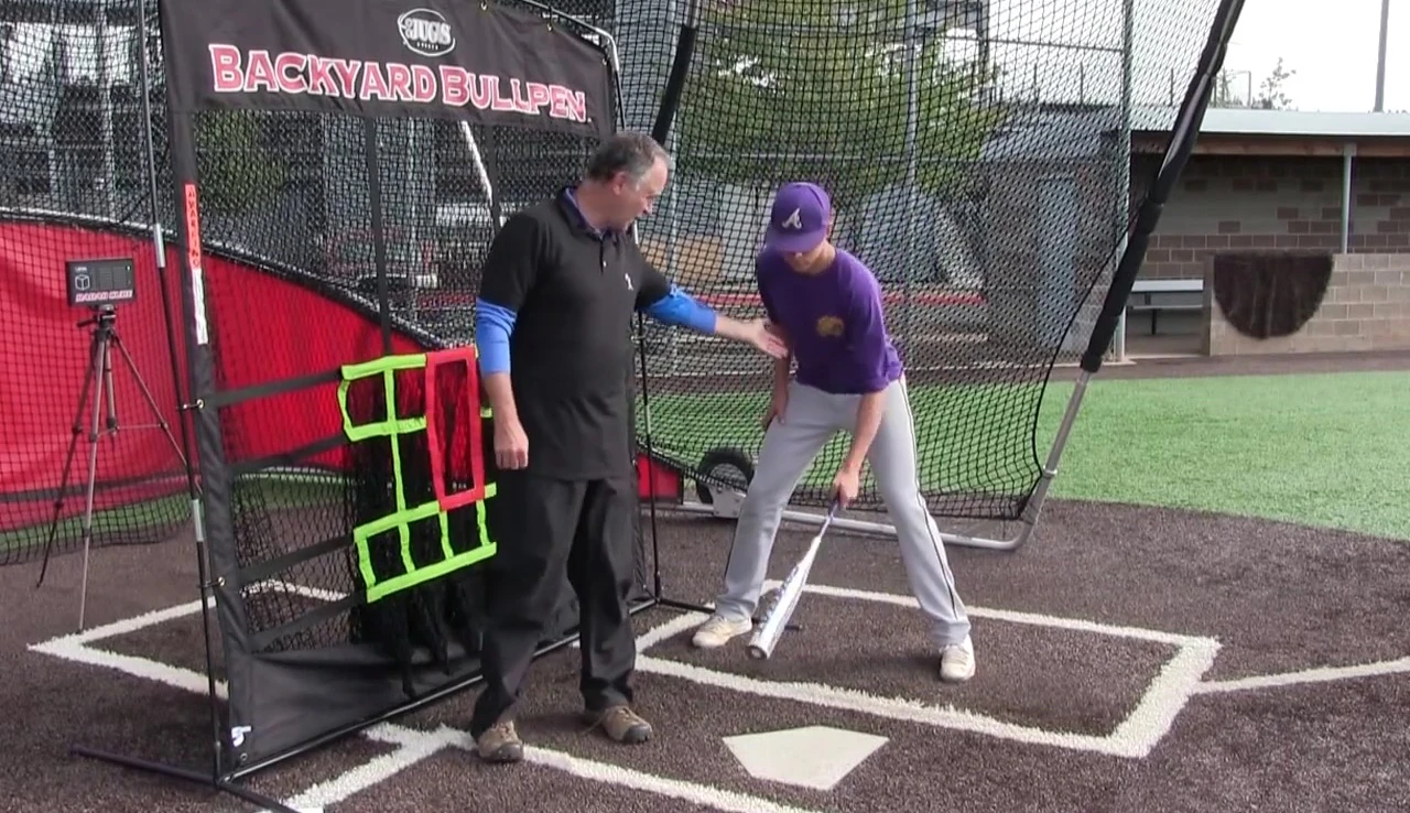 Batter demonstrating belly button placement and waist bend