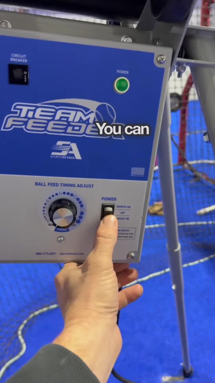 Turn the pitching machine on. Set the bottom wheel two numbers higher than the top wheel (e.g., 3 and 5) to achieve optimal backspin for ball flight.