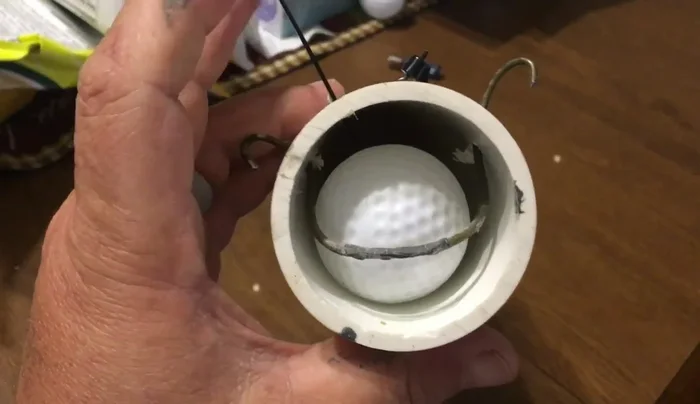 Reloading the chamber after firing.