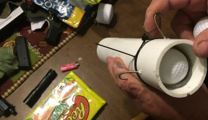 Reloading the chamber after firing.