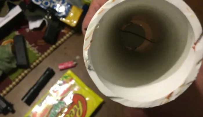 Reloading the chamber after firing.