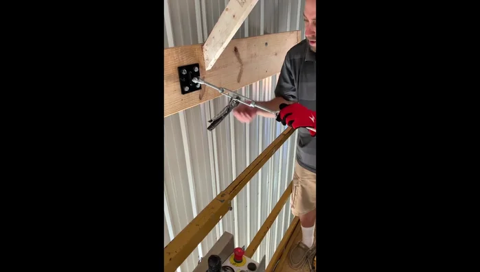 Tighten the turnbuckle using an adjustable wrench.