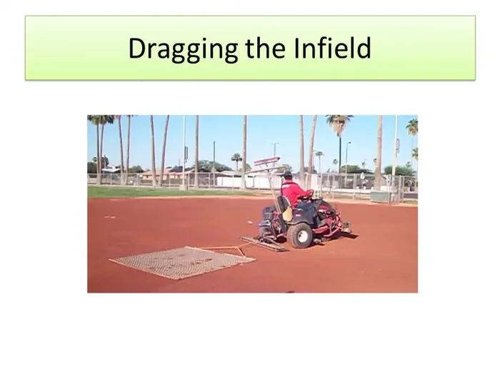 Drag the infield: Start at the center and make 2-3 concentric overlapping passes (6-12 inches overlap).