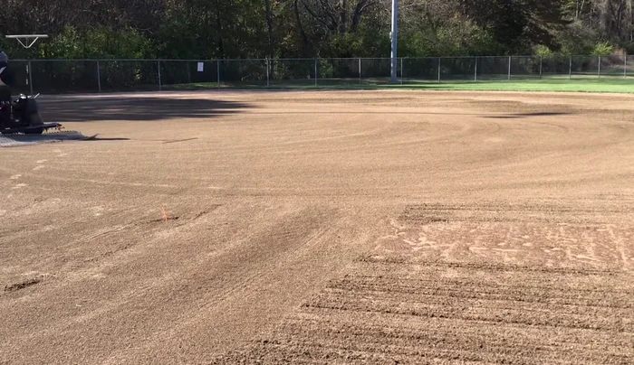 Finish by making smaller circles to knock down ruts and ensure even surface.